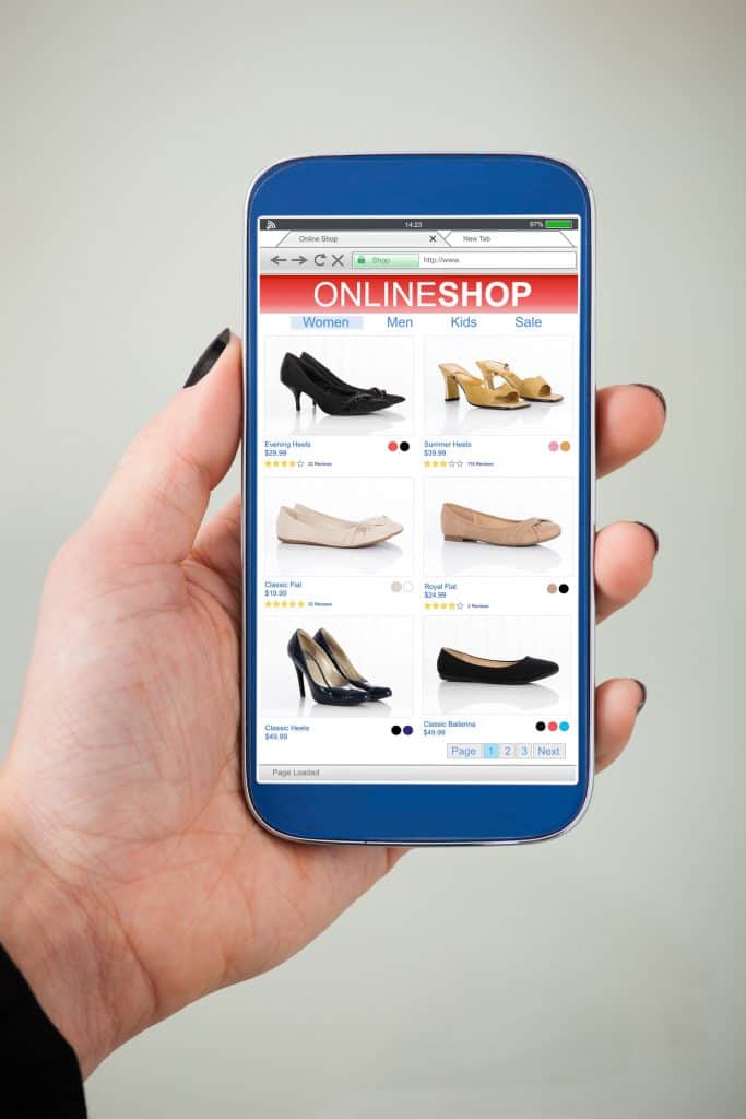 Woman seeing shoes online that are shown from marketing campaigns.